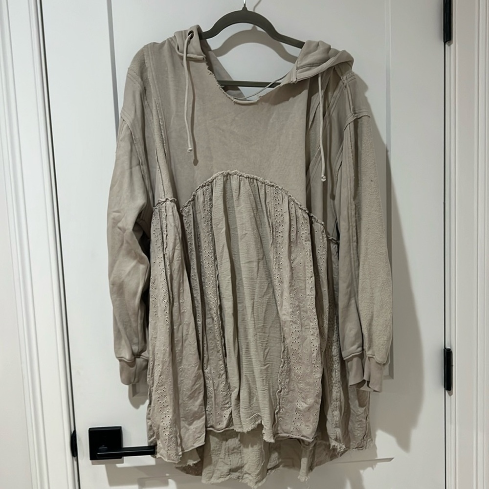 Never been worn but tags are cut off Free People hoodie.